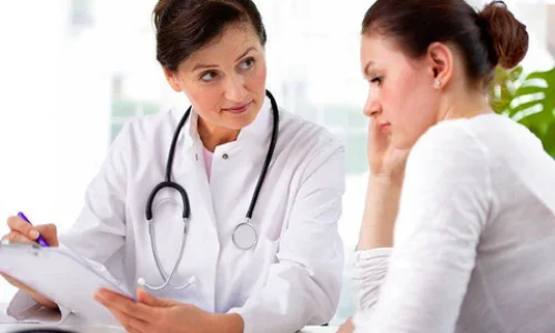 Patient consulting doctor to seek medical assistance